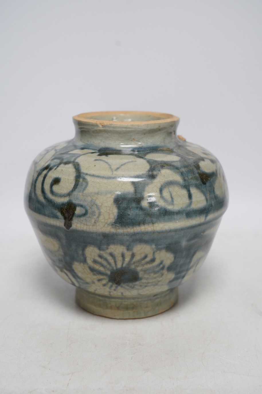 A provincial Chinese Ming dynasty vase, 18cm. Condition - commensurate with age